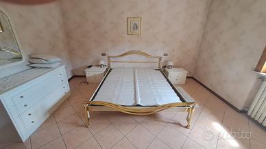 camera da letto matrimoniale ottone