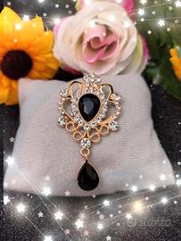 Spilla vintage in metallo 