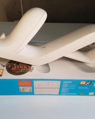 Wii console con comandi e videogiochi