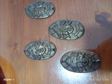 Antichi fregi in ottone 