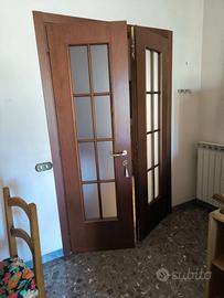 Porta a due ante vetrata