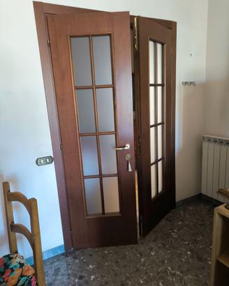 Porta a due ante vetrata