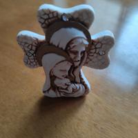 Statuina sacra Sacra Famiglia su croce decorata