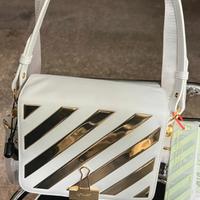 Borse edizione limitata color oro off-White