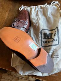 Scarpe nuove di lucertola