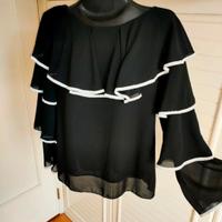 Blusa nera con volant