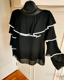 Blusa nera con volant