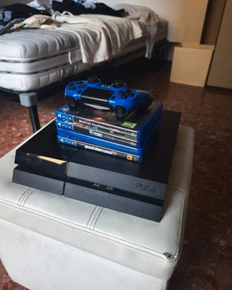 console PlayStation 4 + joystick blu + 4 giochi