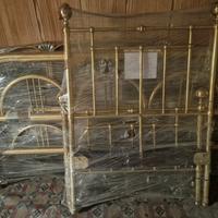 strottiura letto in ottone dorata