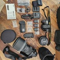 Fotocamera  ,obbiettivi e vari accessori