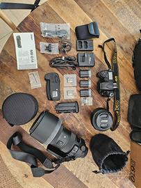 Fotocamera  ,obbiettivi e vari accessori