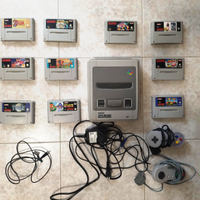 Super Nintendo (SNES) + 2 controller + 10 giochi