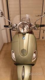 vespa lxv 125 piaggio verde