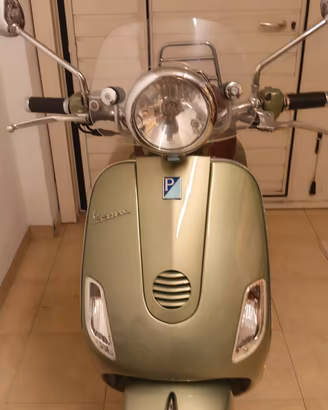 vespa lxv 125 piaggio verde
