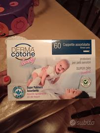 coppette latte  e paracapezzoli in argento 