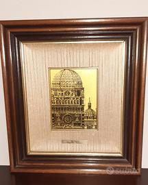 Opera tirata con torchietto a mano su argento 800