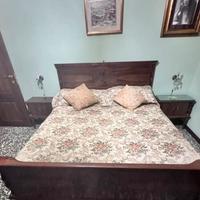 Letto con comodini