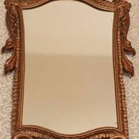 Specchio antico con cornice intagliata 