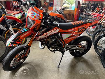 Orange Ktm 125 SX motard omologata
