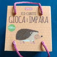 Torre di cubi e libro illustrato educativo 