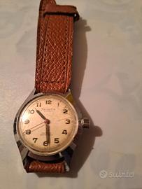 HELVETIA anni ’40 – Quadrante patina crema e lance