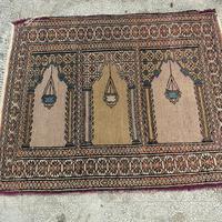 Tappeto orientale annodato a mano da rigenerare