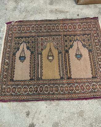 Tappeto orientale annodato a mano da rigenerare