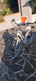 Bicicletta donna con seggiolino bambini