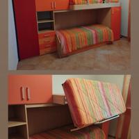 Camera con armadio a ponte