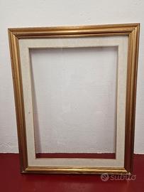 Cornice quadro in legno dorata