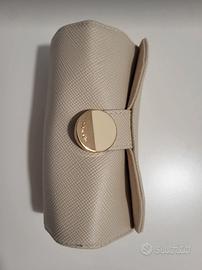 portagioie arrotolato da viaggio