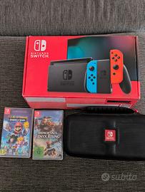 Nintendo Switch con Scatola + 2 Giochi + Custodia 