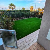 Trilocale fronte mare con giardino Rif.1019