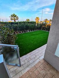 Trilocale fronte mare con giardino Rif.1019