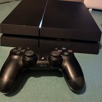 PlayStation 4 PS4 con joystick e giochi