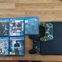 Ps4 slim con 2 joystick e 5 giochi. 