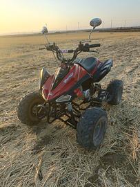 quad 125