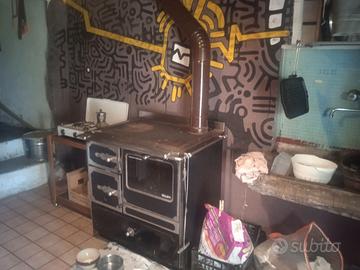 Casa a schiera pietra e legno