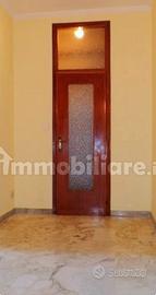 Porte in legno con vetro lavorato