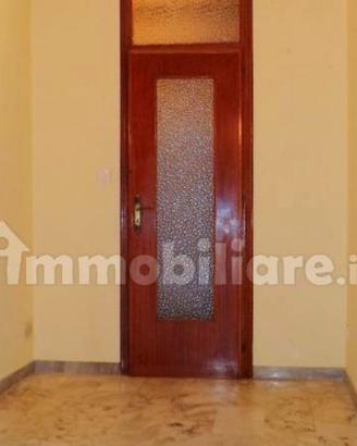 Porte in legno con vetro lavorato