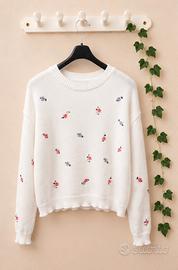maglione con fiori ricamati