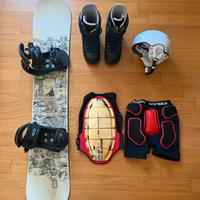 snowboard Salomon, scarponi Burton, caschetto