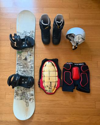 snowboard Salomon, scarponi Burton, caschetto