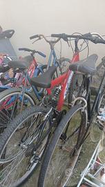 bicicletta rossa con ammortizzatori