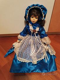 Bambola in ceramica vestito blu