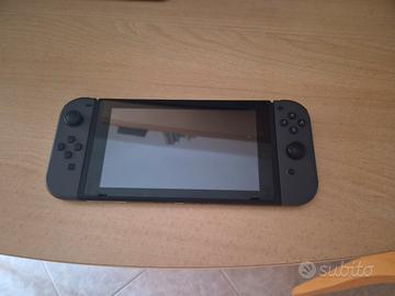 Nintendo Switch  + custodia + giochi + ring fit