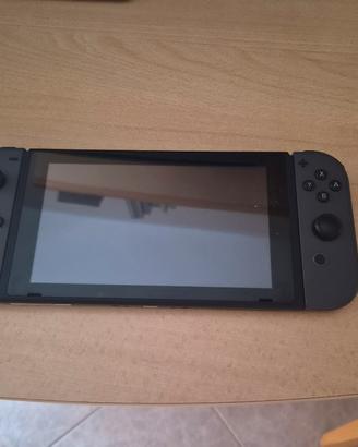 Nintendo Switch  + custodia + giochi + ring fit