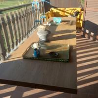 Tavolo lungo da interno o esterno coperto 