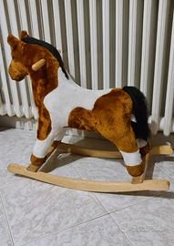 Cavallo legno musicale