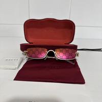 Occhiali da sole gucci con lenti a specchio rosa